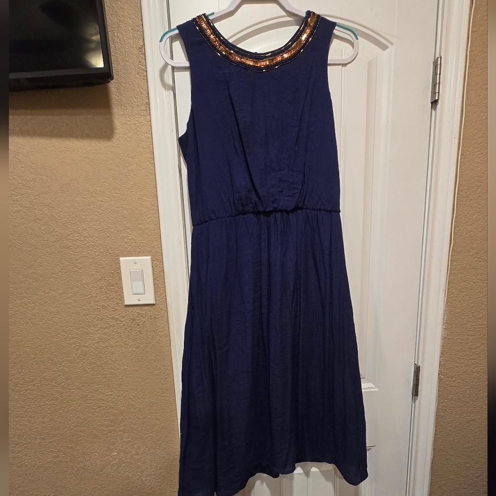 Elegant Navy Blue Dress with Gold Accents
